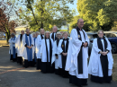 the clergy and lay ministers procession, all looking happy with lots of smiles
