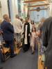 Dominic and family bring up the rear of the procession